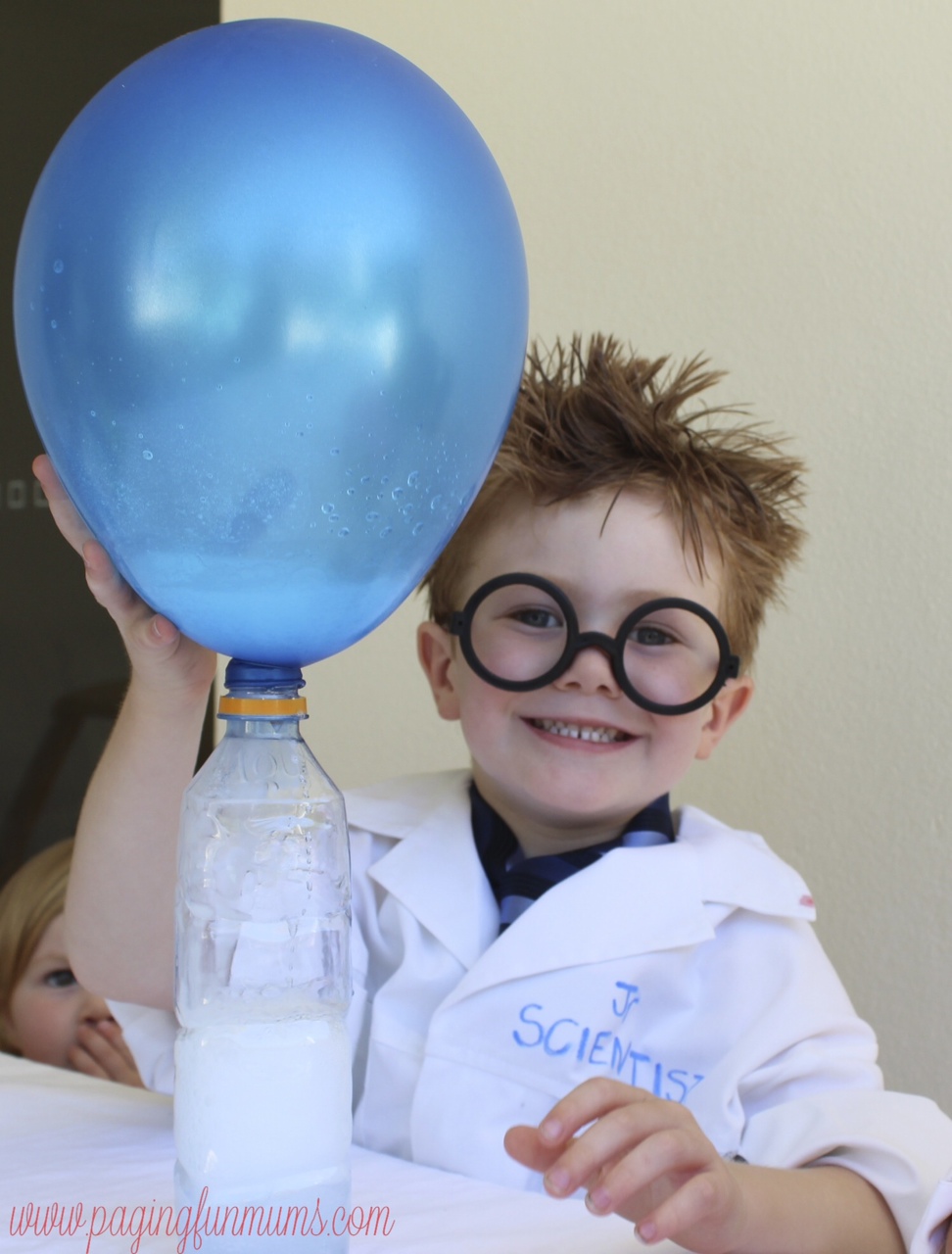 Look at the smile! The cutest little scientist ever!