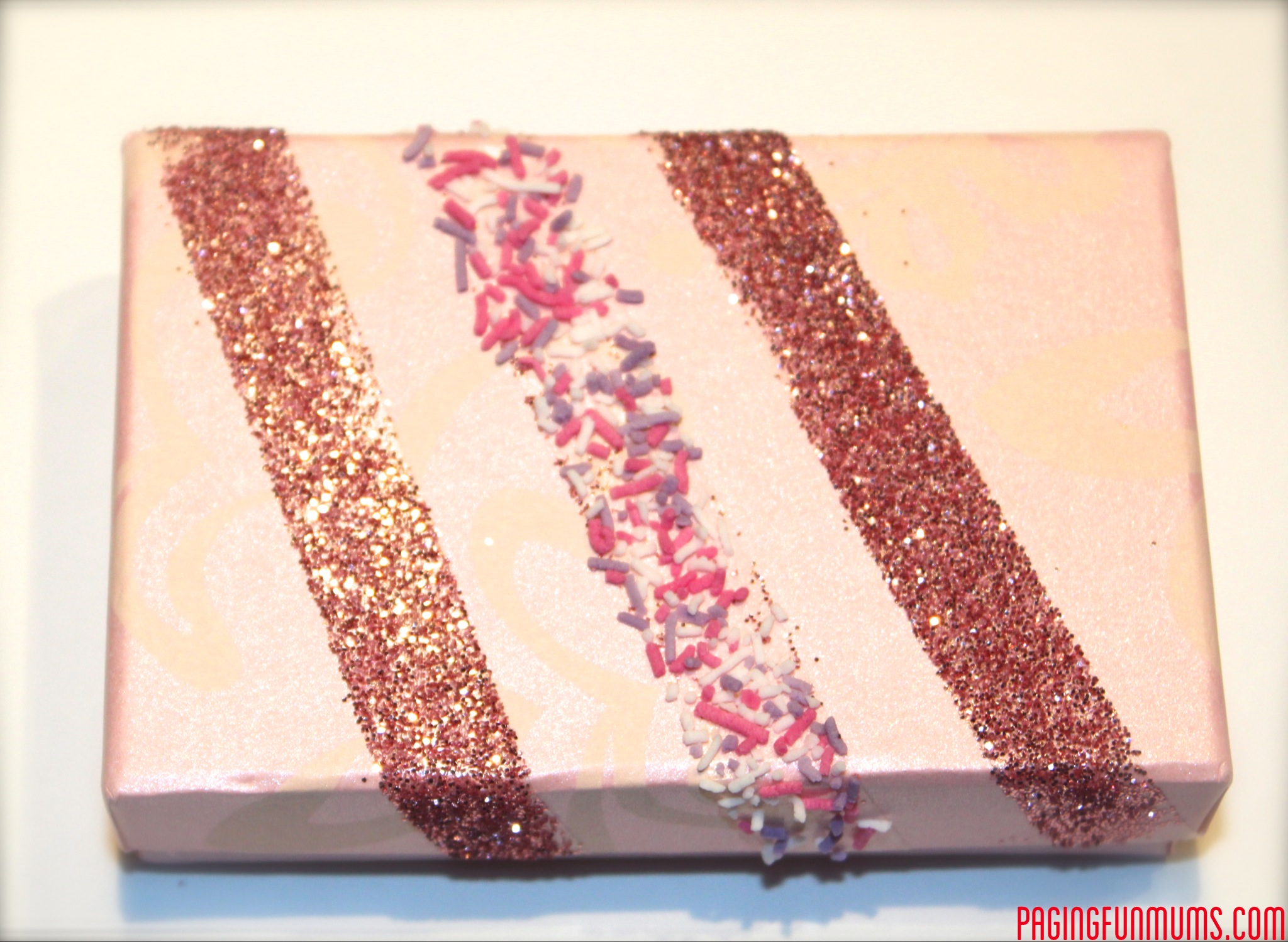 Glitter & Sprinkles + Double Sided Tape = Fun Gift Wrapping Idea