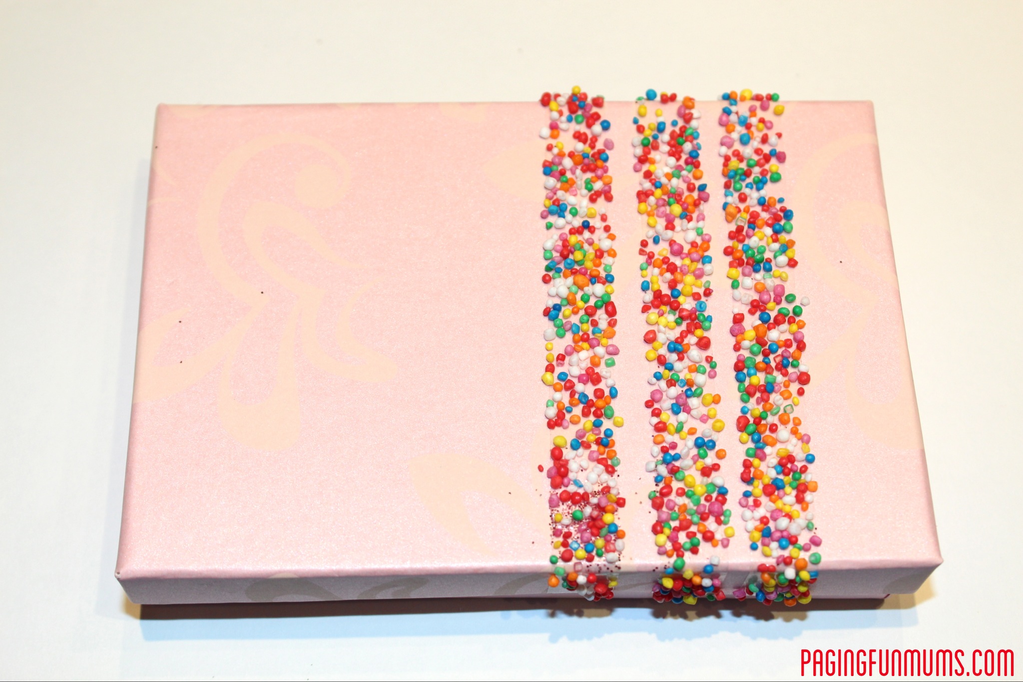 Glitter & Sprinkles + Double Sided Tape = FUN Gift Wrapping Idea!